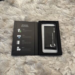 NIB PEEL iPhone 16 Pro Max Glass Screen
Protector